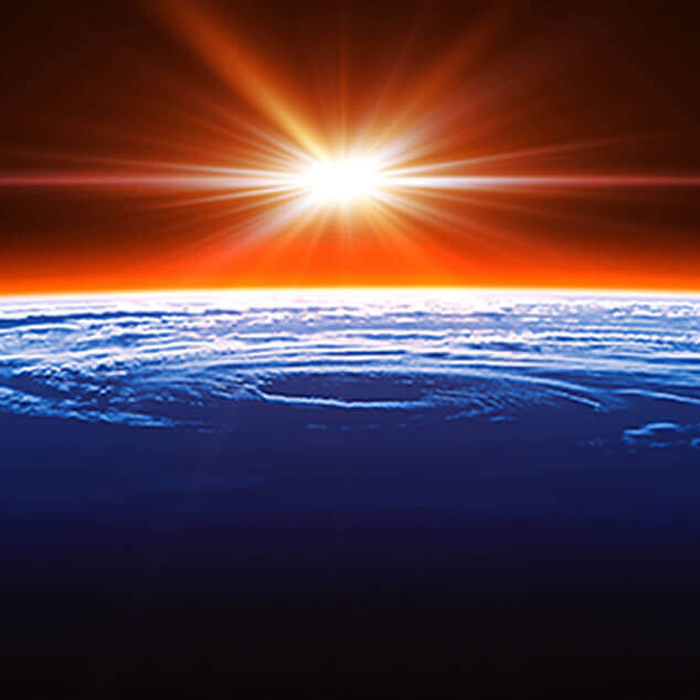 An orange-and-blue abstract image of the edge of the Earth's atmosphere. 