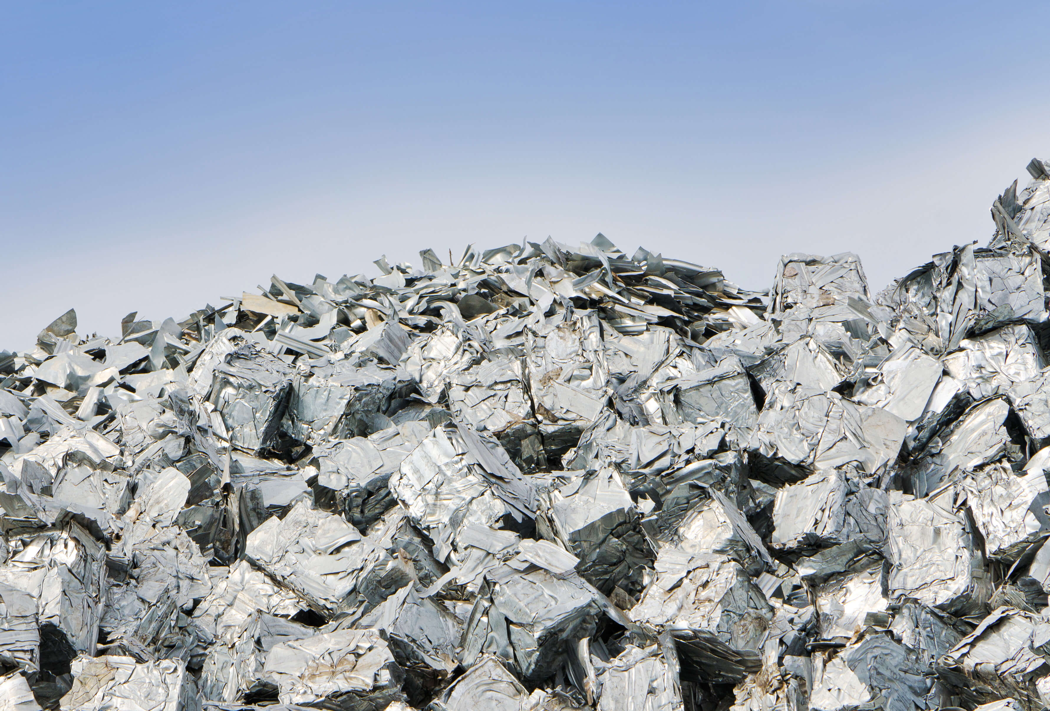 Raw metals in a big silver pile for processing.